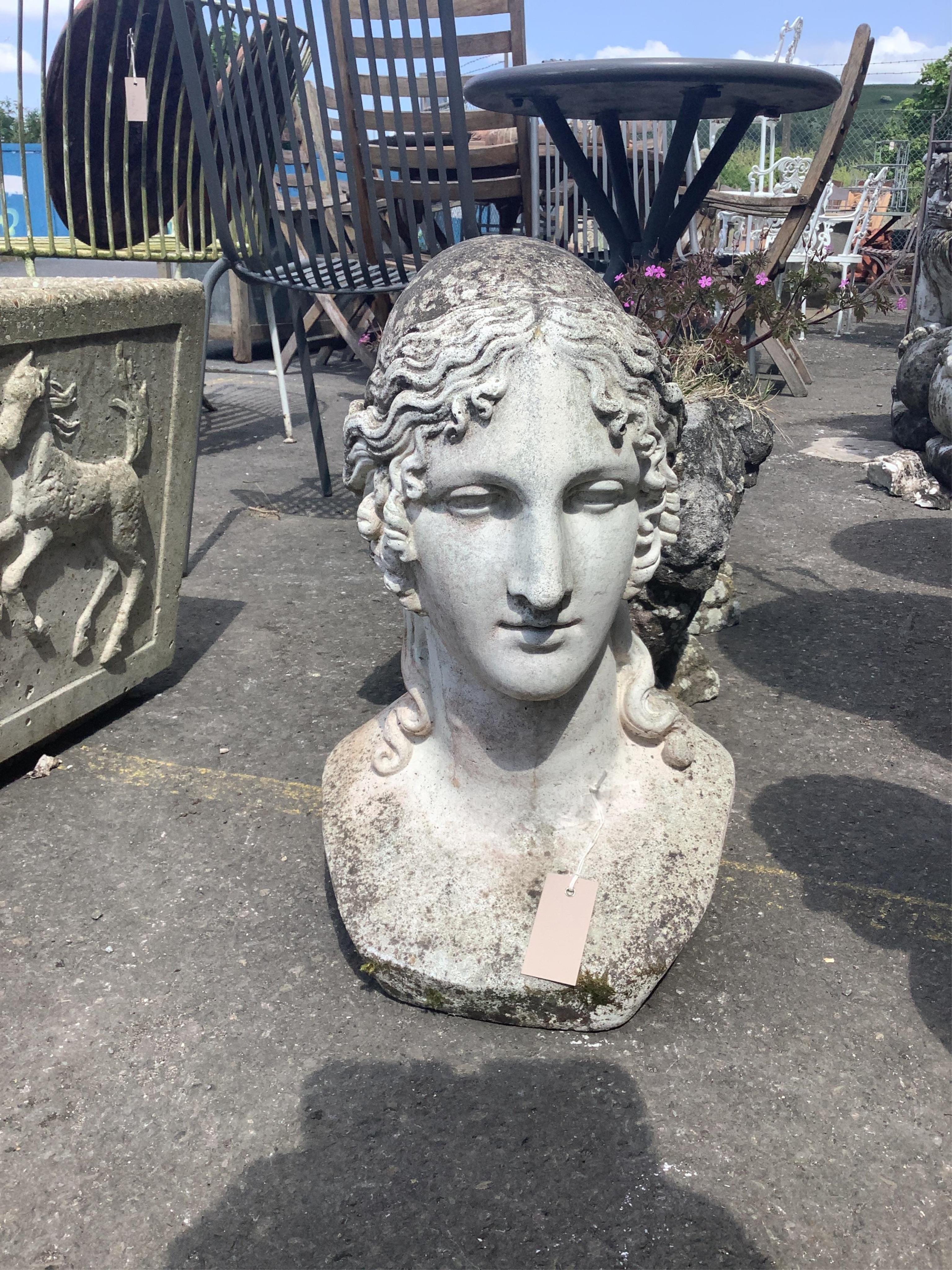 A reconstituted stone classical female bust garden ornament, height 50cm